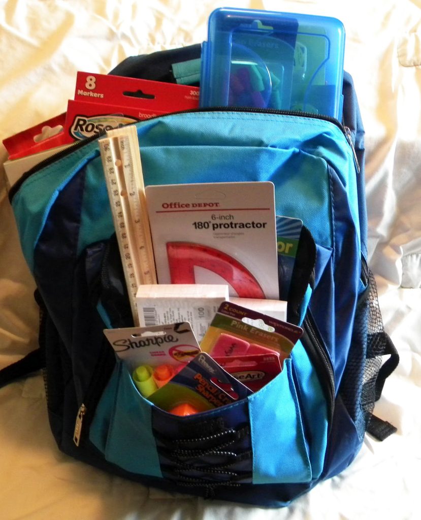 back to school backpack filled with school supplies