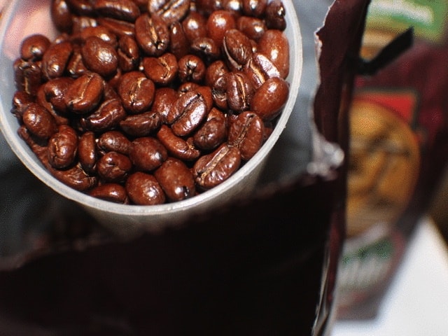 Roasted-Coffee-Beans-in-grinder