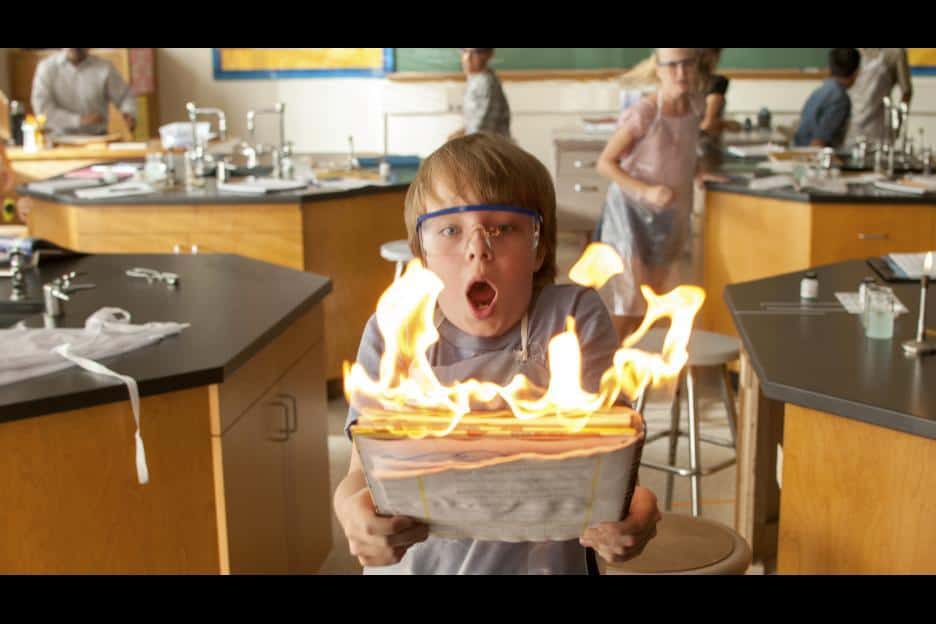 Alexander fighting fire in chemistry class