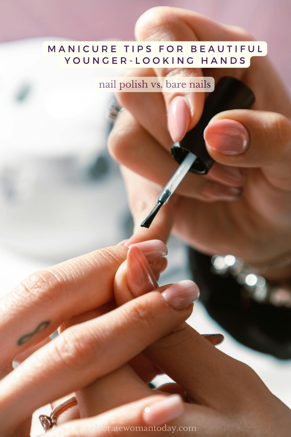 applying nail polish on beautiful hands