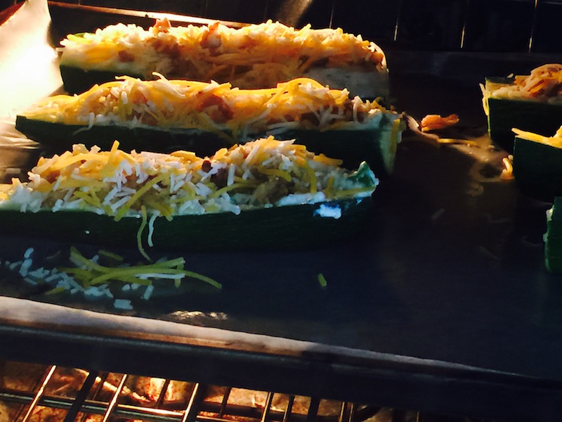 stuffed zucchini baking in the oven