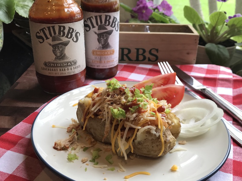 Easy holiday recipe of slow cooker shredded chicken bbq baked potato