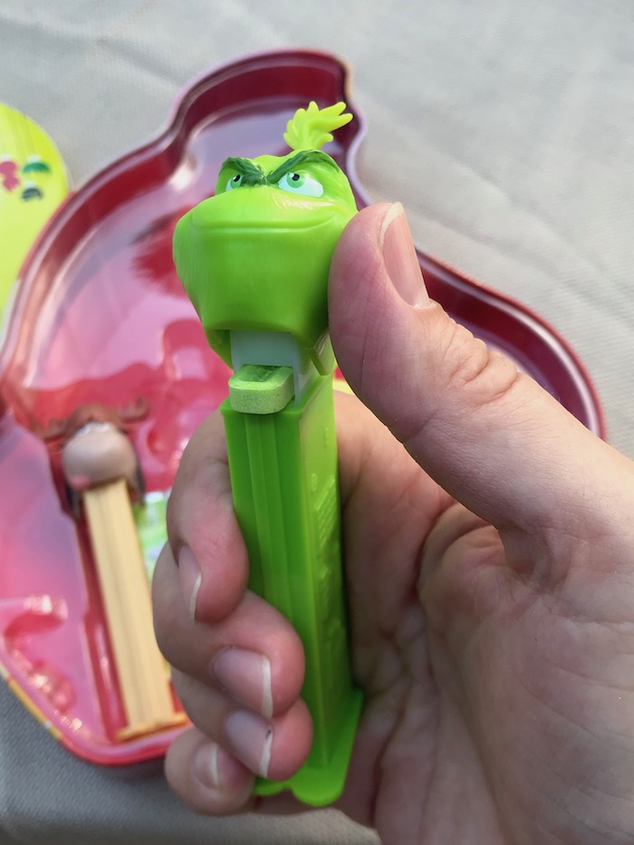 Who is a huge Fan of PEZ candy? This iconic candy with character offers the limited edition candy dispenser heads with this THE GRINCH PEZ gift tin.