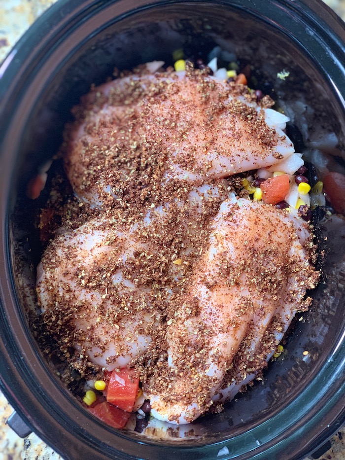CrockPot Mexican chicken recipe can be used over quinoa, rice, in salads, and tacos
