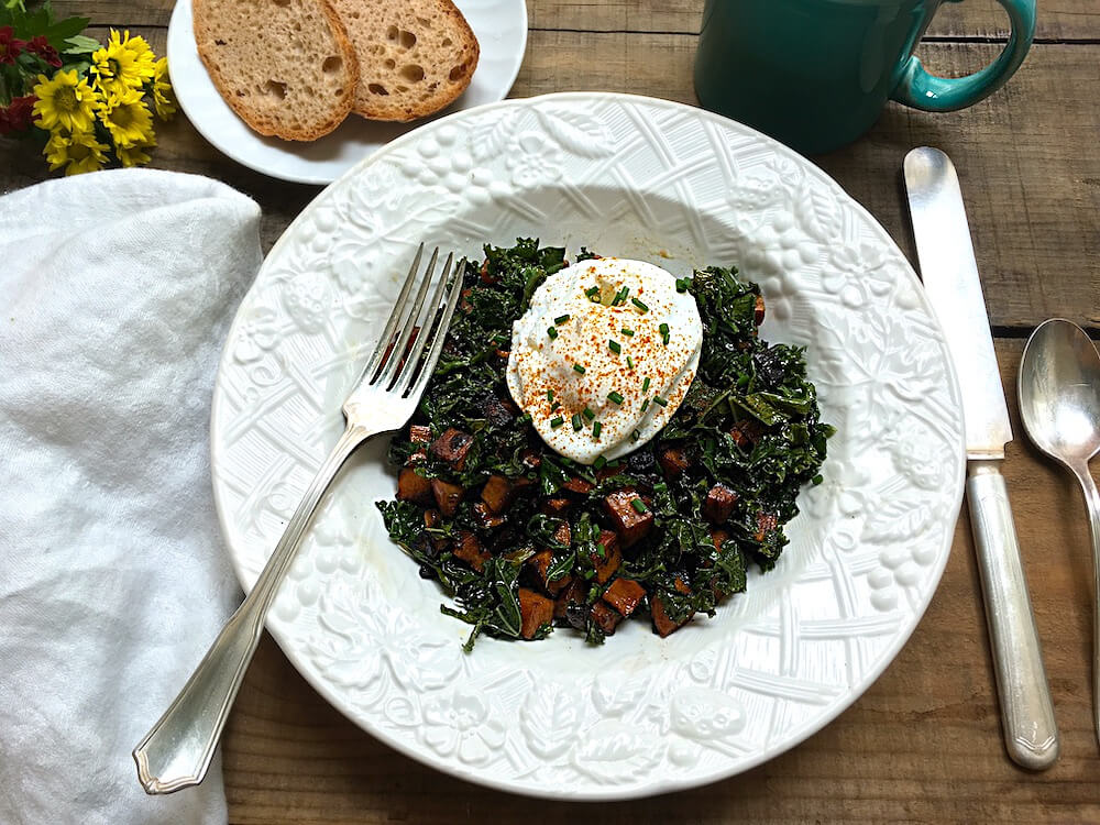 Sweet potato hash with kale and pouched eggs