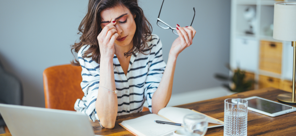 woman in stress at her desk
