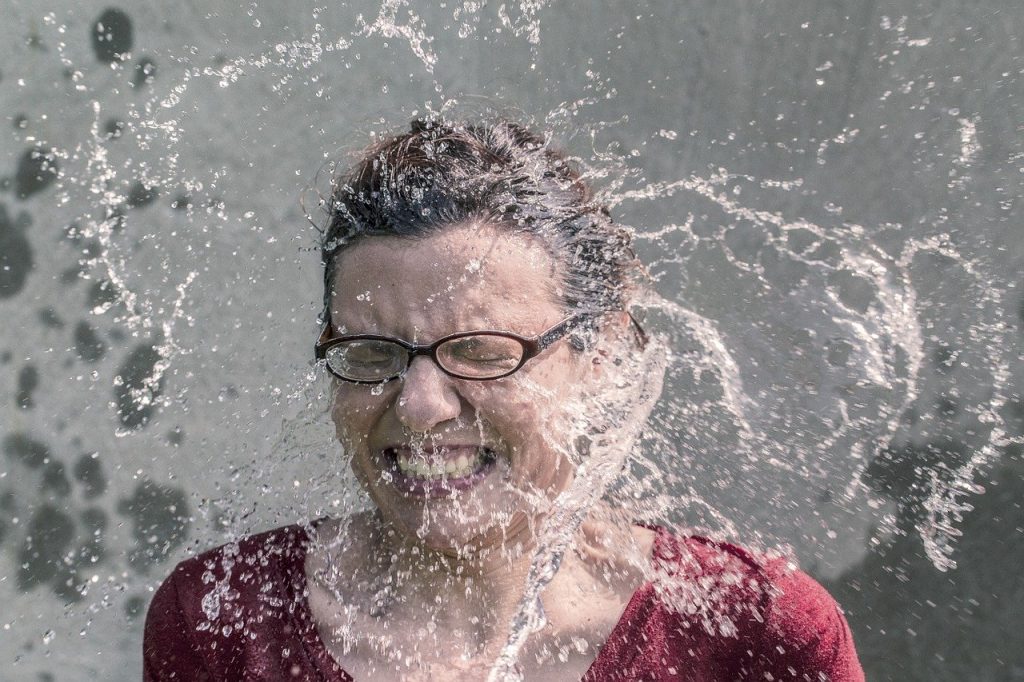 woman in water splashes