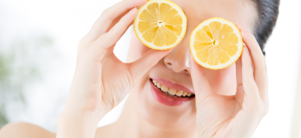 lemon slices over woman's face