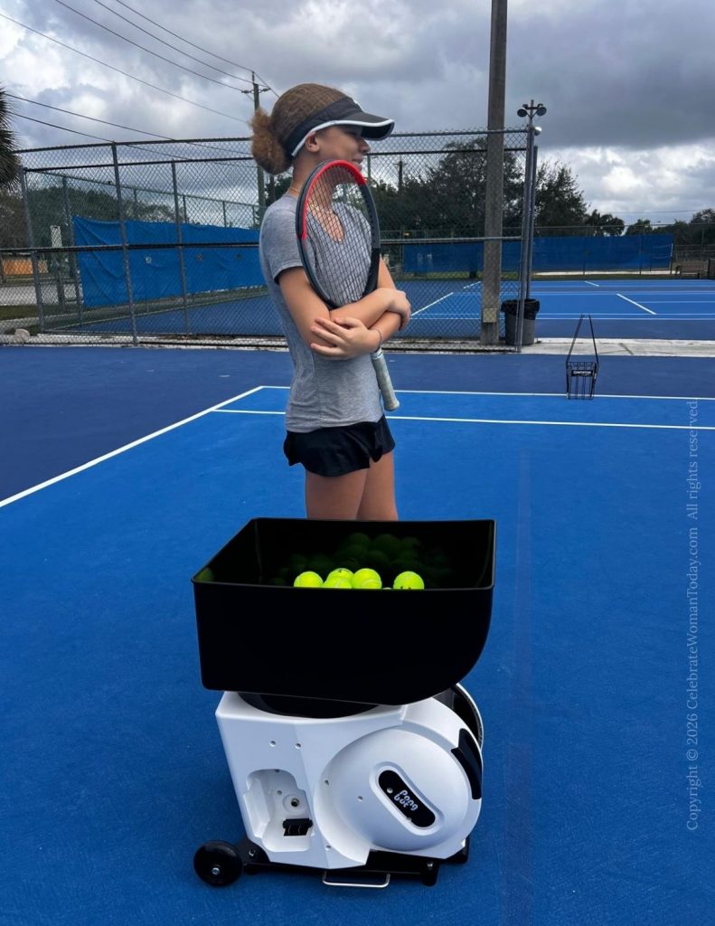 tennis player with PONGBOT Tennis Ball Machine