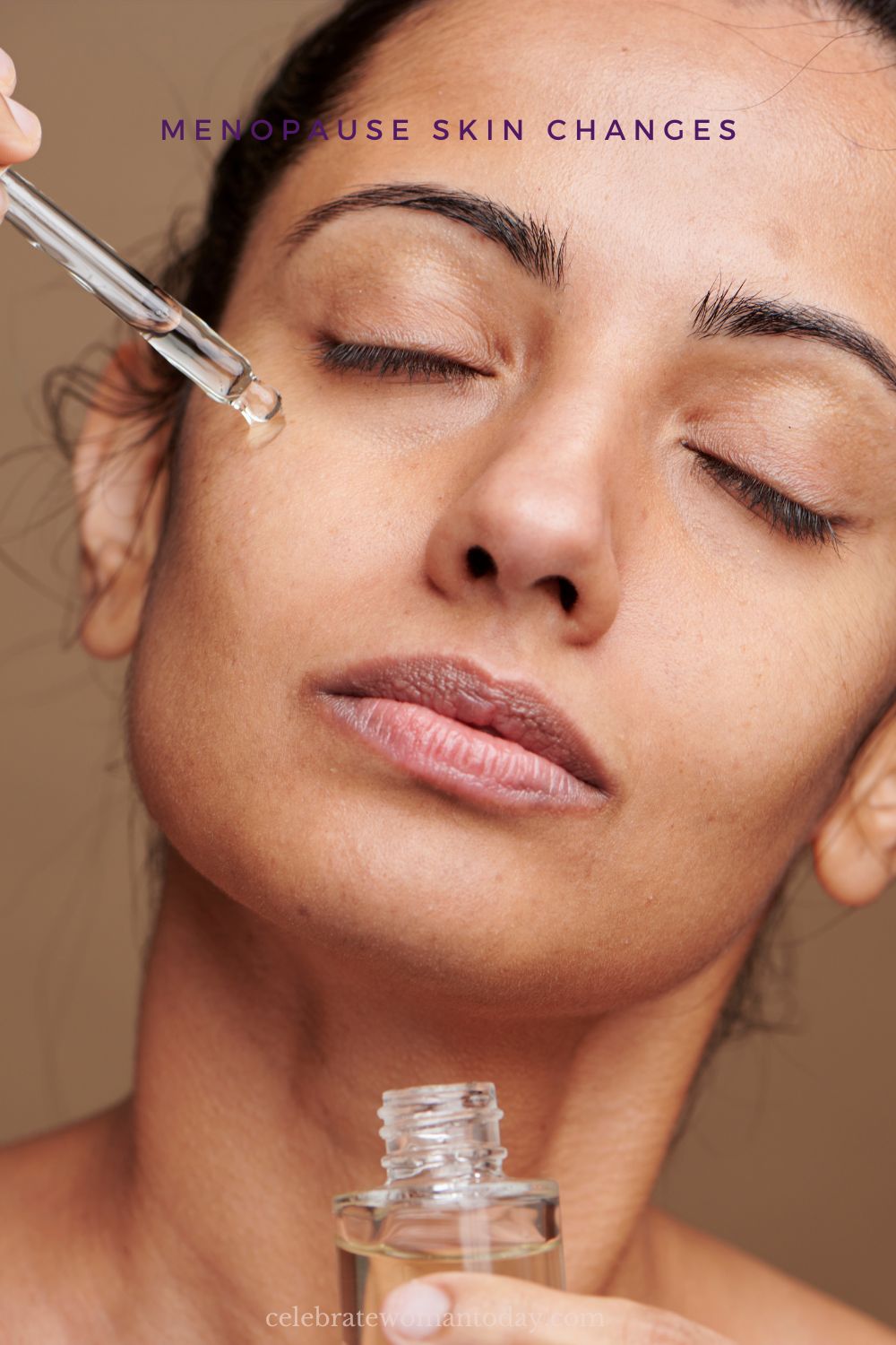 woman applying serum to facial skin