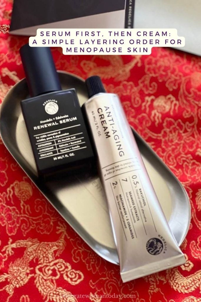 Regelica renewal serum bottle and bakuchiol cream tube together on a metal tray over red dragon brocade